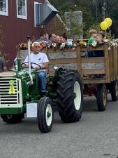 A tractor pulls a wagon full of riders during Sussex County Day on Sunday, Sept. 17 at the fairgrounds in Augusta. (Photos by Deirdre Mastandrea)