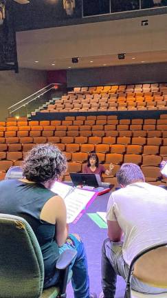 Deborah Gianuzzi, music director and professor at SCCC, works with the cast of ‘Alice by Heart.’