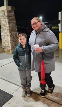 Thomas Kelly and his mother, Danielle, arrive for Hardyston’s annual tree lighting ceremony.