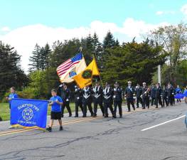 Members of Hampton Township Fire &amp; Rescue march in the Sussex County Firemen’s Association’s annual Inspection Day &amp; Parade on Saturday, Oct. 5. They were the host this year in honor of their 25th anniversary. (Photos by Maria Kovic)