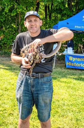 Jeff Kaplan with Gwendolyn, a ghost boa constrictor.