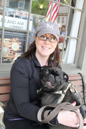 Kristy Voorhees of Sparta with her pug, Baxter.