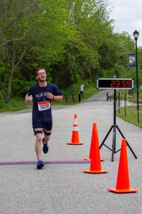 Kyle Dehn, 25, of Glenwood finished the race in fourth place with a time of 23 minutes 58.3 seconds.