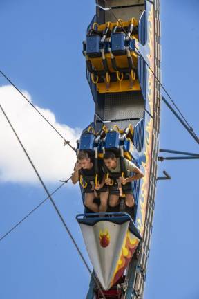 Passengers face the ground as the ride goes in a full circle. (Photo by John Hester)