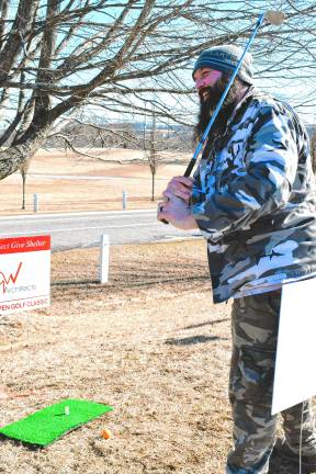 <b>CG2 Dave Whisner Jr. takes his shot in the Chili Open Golf Classic, which benefits a Project Self-Sufficiency initiative to help Sussex County residents who need emergency temporary shelter or stable housing. (Photos by Maria Kovic)</b>