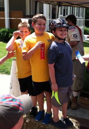 Pack 298 competed in the 19th Annual Franklin Soap Box Derby on June 22. In the Bear division, Anthony Pelusio won first place, Christopher Carey, second place, and Kenny Coffaro third place.