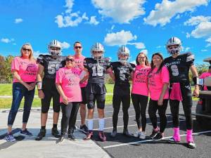 Wallkill Valley Football Rangers pose with their mothers, all breast cancer survivors. (Photo provided)