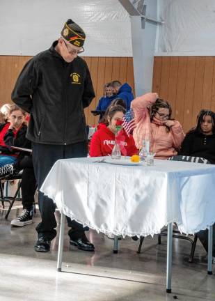 <b>Frank Arminio conducts a POW/MIA ceremony. </b>