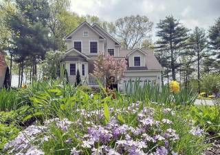 Upscale home offers mountain views and great location