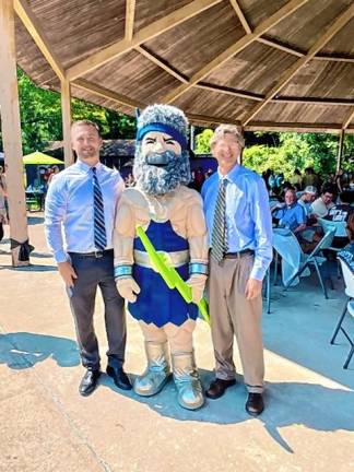 Sussex County Community College president Jon Connolly, right, and Cory Homer, vice president of student success, pose with Skylor the Mascot. (Photos provided)