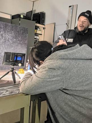 FP1 Dan Larco, owner of Quarry Grill in Franklin, teaches Wallkill Valley Regional High School students how to photograph food. (Photos provided)