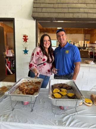 PC2 Sussex County Commissioners Dawn Fantasia and Chris Carney helped serve food at the picnic.