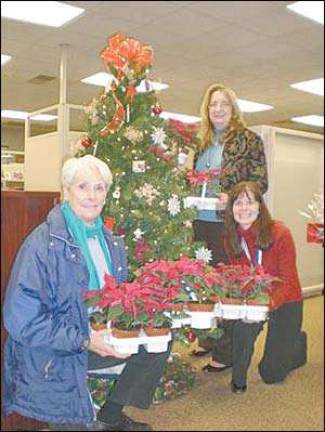 Hospice staff and volunteers deliver holiday delights to families