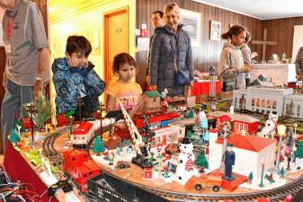 <b>Luke and Maggie Gibson of Oak Ridge look at the Holiday Train Display on Saturday, Nov. 23 at Prince of Peace Lutheran Church in Hamburg. The display was set up by the Sussex County Railroad Club. (Photo by Maria Kovic)</b>