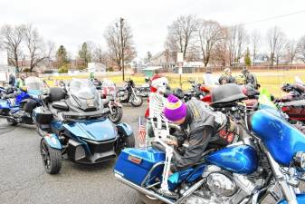 Roberto Martinez of Washington, N.J., checks his bike before the 51st annual Dale’s Chilly Chili Run, a 35-mile escorted ride hosted by the Blue Knights, on Wednesday, Jan. 1. (Photos by Maria Kovic)