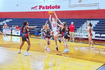 HP1 High Point's Ashley Schell leaps during a shot in the second half of the game against Lenape Valley on Jan. 10. The Wildcats lost, 49-37. (Photos by George Leroy Hunter)