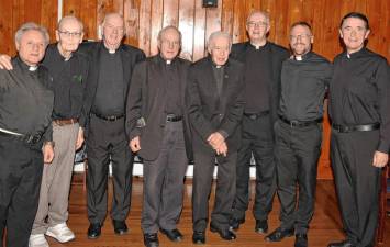 The Knights of Columbus Marquette Council 588 hosts its 22nd annual Pride in Our Priests Dinner on Oct. 1 at Sheridan’s Restaurant and Tavern in Newton. About 35 people, including eight priests, attended. (Photos provided)