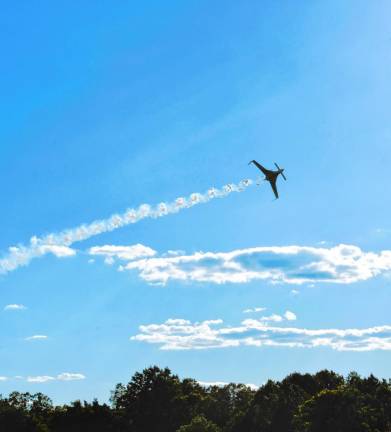 AIR6 A plane soars during the New Jersey Airshow at Greenwood Lake Airport on Saturday, June 15. (Photo by Maria Kovic)