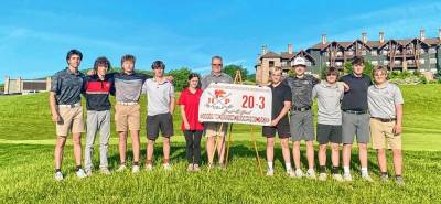 The High Point Regional High School golf team poses with a banner showing its record for the season. (Photo provided)