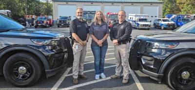 <b>From left are 911 Communications Center Director Mark Rozek, dispatch supervisor Andrea Wehrenberg and Sheriff Michael Strada. (Photo provided)</b>