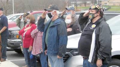 Participants recite the Pledge of Allegiance (Photo by Janet Redyke)