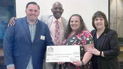 From left: Joe Hession, chief executive officer of SNOW Operating; Howard Burrell, Vernon Township mayor; Lisa DeRitter, Vernon Coalition coordinator, Center for Prevention &amp; Counseling; and Becky Carlson, executive director, Center for Prevention &amp; Counseling. (Photo provided)