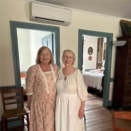 DR4 DAR chapter members Jean Zwirek and Barbara Sauve dressed in period costumes to give tours of the Rev. Elias Van Bunschooten Museum in Wantage.