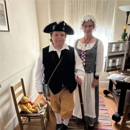 DR6 August Ziccardi and Wendy Wyman wore period costumes.