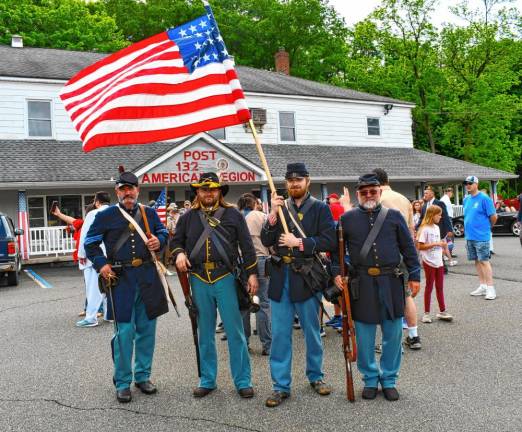 Civil War re-enactors line up in front of American Legion Post 132 in Franklin.