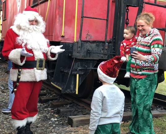 Santa asks a boy if he has been naughty or nice this year.