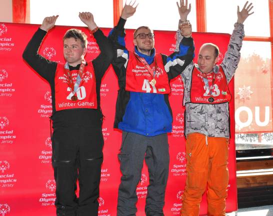 <b>Special Olympians on the podium. (Photo by Maria Kovic)</b>