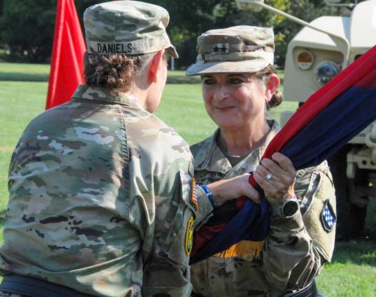 Maj. Gen. Kris Belanger assumes command of the U.S. Army Reserve’s 99th Readiness Division during a change-of-command ceremony Aug. 11 at division headquarters on Joint Base McGuire-Dix-Lakehurst. (U.S. Army photo by Shawn Morris, 99th RD Public Affairs)