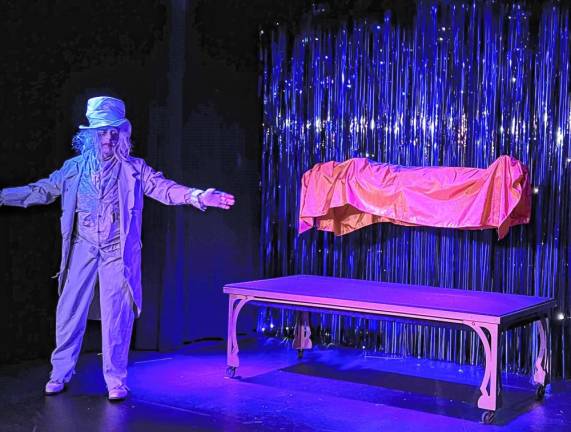 Theodora (MaryAnn D’silva) is levitated by Lord Charles (Joe Garsetti). (Photo by Celeste DeCamps)