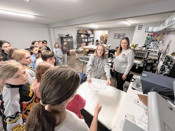 Members of Future Business Leaders of America at Ogdensburg Middle School visit Stand Out Sports and Apparel, which does screen printing and embroidery on T-shirts, hoodies, and corporate and sports apparel. (Photos provided)