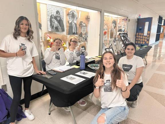 National Art Honor Society members collect money at the fundraiser, From left are Krysten Baez, Riley Simon, Addyson Delcalzo, Becky Krueger and Amanda Barone.