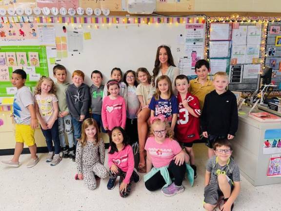 Miss Hardyston Kayla Van Ginneken reads to students at Hardyston Elementary School earlier this month.