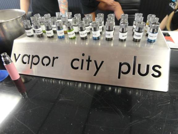 A small sample of the 200-plus flavors of e-liquid available from Vapor City Plus.