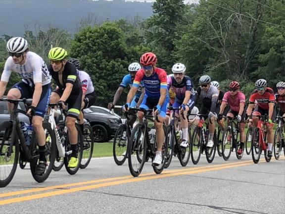 Participants in the Giro del Cielo bike race ride past Frankford Park in Branchville on July 9, 2023. (File photo by Kathy Shwiff)