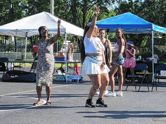 Resident dance during the Juneteenth Celebration.