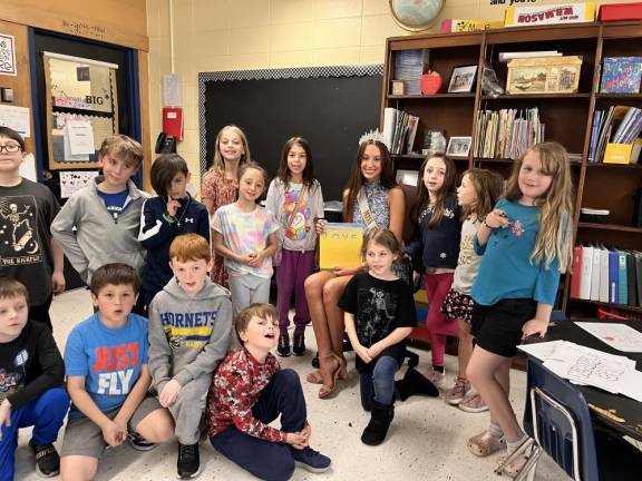 Miss Hardyston Kayla Van Ginneken reads to students at Hardyston Elementary School earlier this month.