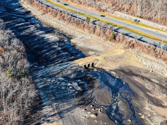 <b>A bridge usually covered by water is visible in the Oak Ridge Reservoir in Jefferson on Nov. 18. At right is Route 23. (Photo by Nick Horton, www.thepathfinderstudios.com)</b>