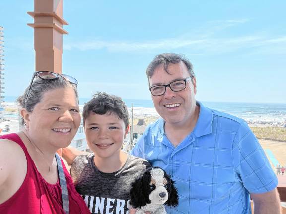 Amanda and John Bulkeley with their son, Brandon, 10.