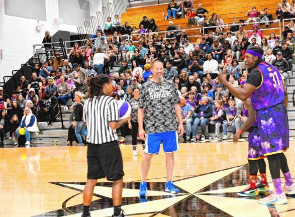 Wallkill Valley Regional High School special-education teacher Dan Gibson and other staff members take on the Harlem Wizards in a fundraising game Saturday night, Nov. 17. (Photos by Maria Kovic)