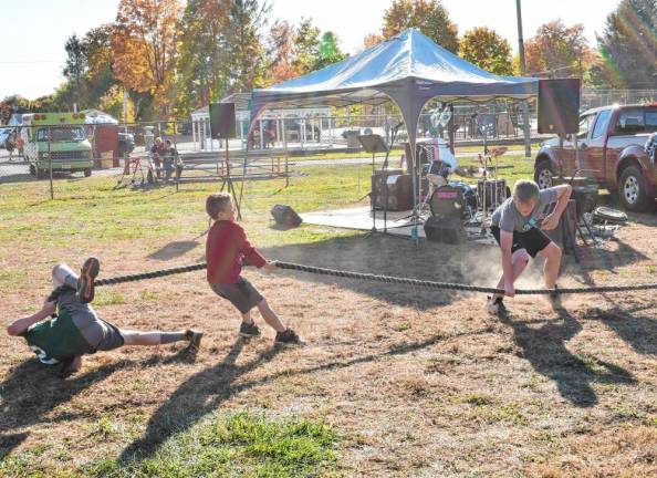 OFF3 A tug of war was among the activities at the event.