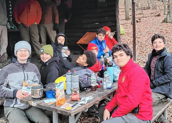 As senior patrol leader in 2023, Noah Adkins of Sparta, front second from right, leads a backpacking trip on the Appalachian Trail.