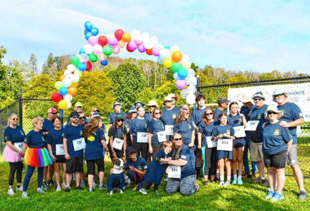 <b>CL6 Members of Noah’s Bulldogs walk in memory of Noah Leyman, formerly of Hampton Township, who died in a highway crash in June 2023 while serving in the Air Force. He was 22.</b>