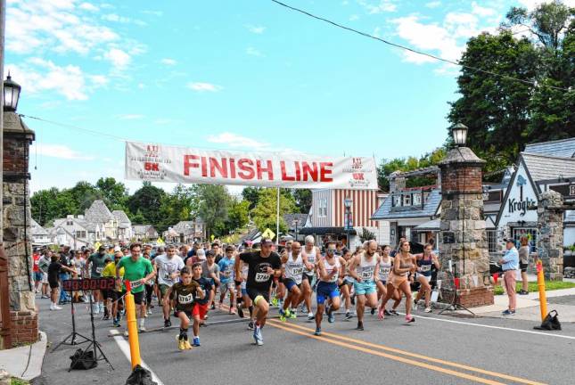 Participants start the Labor Day 5K in Sparta on Monday, Sept. 2. (Photos by Maria Kovic)