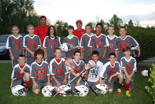 High Point's 5th/6th grade Lacrosse Team was in first row: Zane Birchenough, Billy Gould, Connor Milks, Vincent Boutillette, Aidan Ryan, Devon Liebl (Goalie), Tanner Okeson (4th grade stand in); back row, Lilly Adrendt (fourth-grade stand in), Vaughan Burnell (fourth-grade stand in), Eden Hamer, Frankie Setlock, Ryan VanWingerden (scored winning goal), Gian Porter, Johnathan Fett, Billy Talmadge; coaches: Ron Birchenough, Bill Gould. Not pictured are: head coaches: Andrew Katterman, Marc Russell, and players: Trevor Gruber, Noah Francois Assistants: Chris Mazza, John Morris, Kevin Forrey and all the High School kids that help.