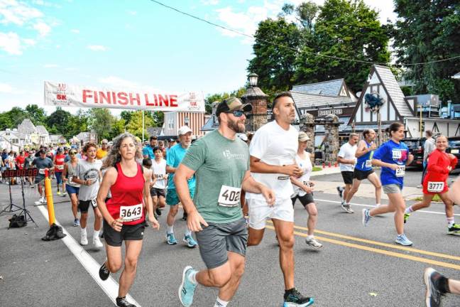 About 250 runners take part in the 5K, which benefits the Lake Mohawk Preservation Foundation and other local environmental initiatives and nonprofits.