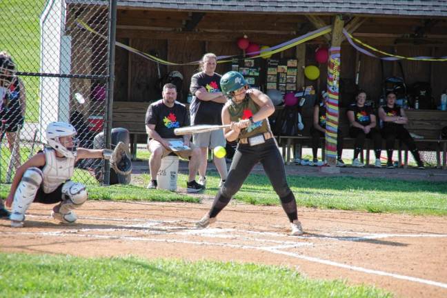 ST3 Sussex Tech batter Caden Ivancich swings at an incoming ball. She made two runs.